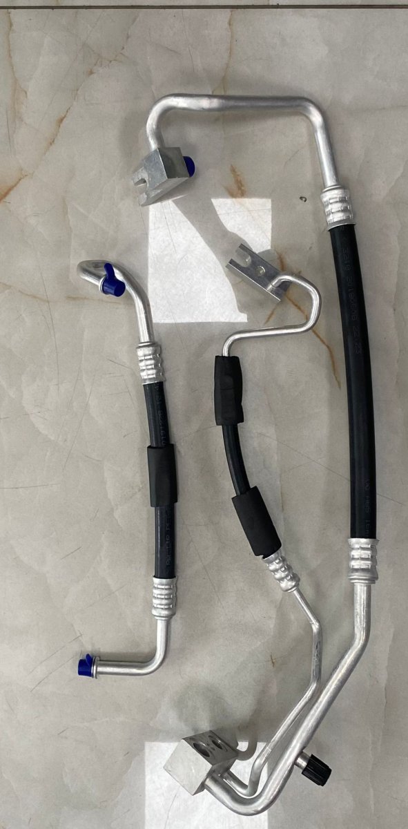 000.002 OPEL CORSA D ÇATALLI KLİMA HORTUMU (OEM:1320335)